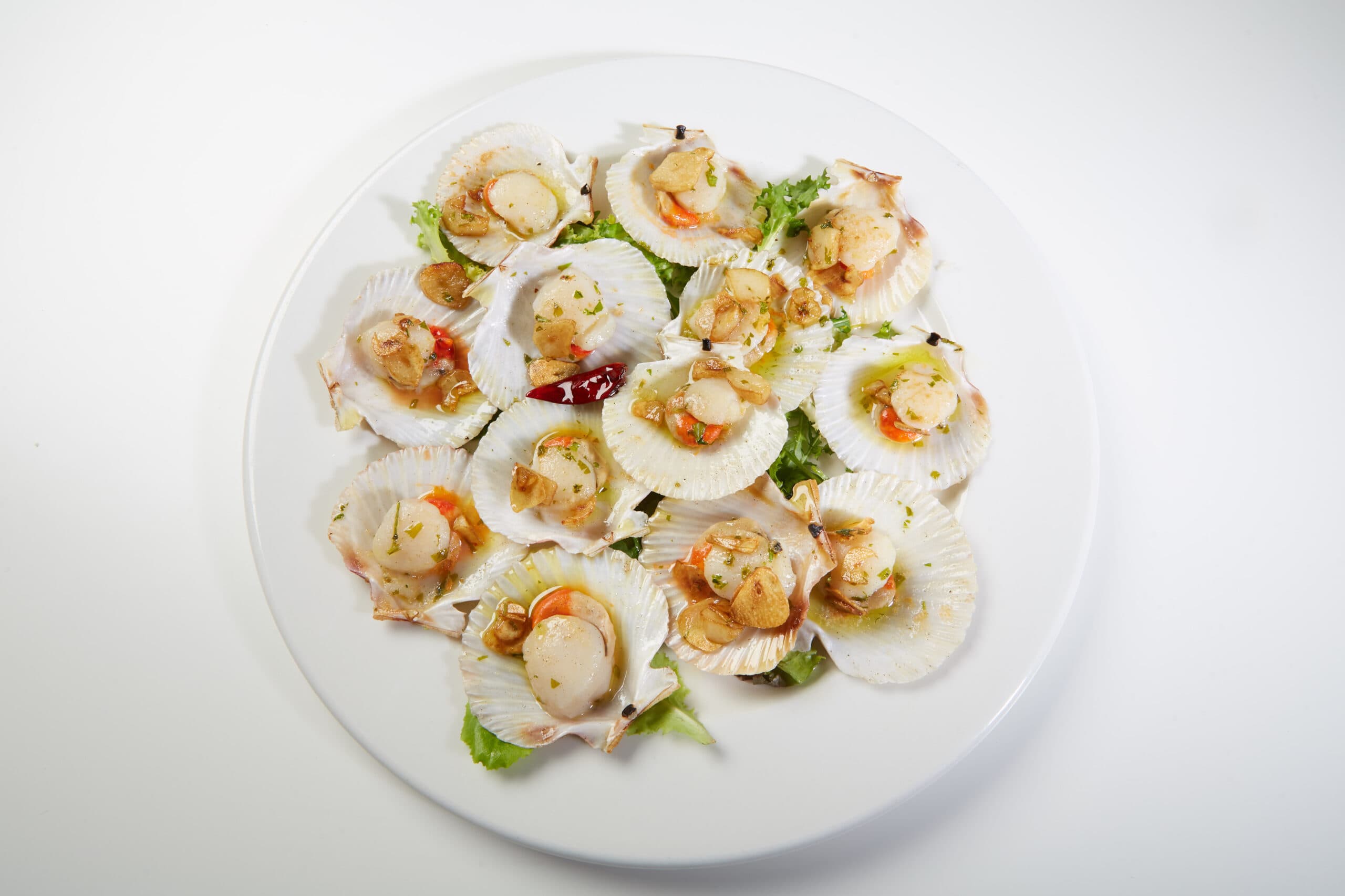 Volandeiras a la plancha con salsa bilbaína